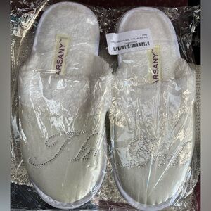 Spa bride slippers one size. Bought for size 8/9. Never used